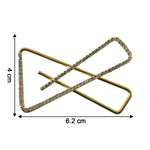 Close-up of golden crystal triangle brooch for scarf styling