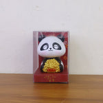 Multiple solar panda figurines in various poses, emphasizing their charm as car interior accessories.