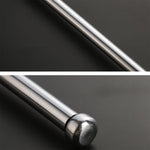 Detailed view of the ergonomic foam handle and wrist strap on the walking stick.
