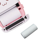 A hand holding a single Papezo thermal printer paper roll, emphasizing its portable size.
