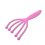 Side profile of the compact AuriGlam handheld scalp massager, highlighting its design.