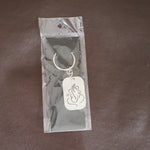 Back view of the Ganesh Metal Keychain, showing its smooth edges and premium finish.