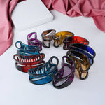 Elegant matte plastic hair clamp grip adding charm and style to any hairstyle.
