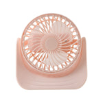 User enjoying cooling from silent mini desktop fan at workspace