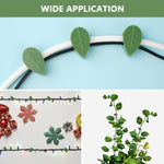 Close-up of an invisible plant climbing wall clip securing a vine.