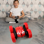 Remote control stunt car in action with 360 degree flips on terrain