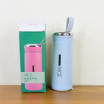 Light blue glass water bottle 400ml emphasizing eco-friendly design