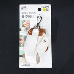 Durable golf accessory pouch with reinforced stitching and wipe-clean surface