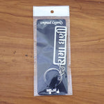 Side view of metallic Gujarati script keychain for car and bike keys