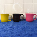 Compact and sturdy plastic tea cup, easy to carry for outdoor adventures.
