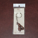 Side view of Bal Krishna metal keychain with sturdy chain and ring