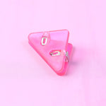 Small triangle paper clip used as corner clip on document