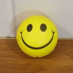 Cute smiley face foam stress ball for relaxation and therapy