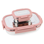 Three stainless steel lunch boxes stacked, demonstrating their compact storage.