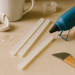 Multiple hot melt glue sticks ready to use with craft glue gun