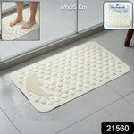 Anti-slip bath mat with suction cups installed in bathroom shower for safety