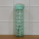 Water bottle displayed with gym and outdoor gear for active lifestyle