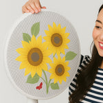 Sunflower mesh fan cover fitted on a ceiling fan