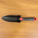 Hand garden trowel for soil preparation and planting