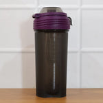 Portable protein shaker bottle ideal for gym and outdoor activities
