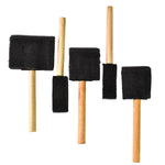 Five sponge paint brushes arranged showing wooden handles and foam tips