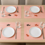 Dining placemat with heat resistant fabric and fish pattern
