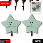 Various household items like keys, scissors, and a towel hanging securely from multipurpose self-adhesive hooks.