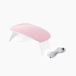 Mini portable nail dryer featuring easy-to-use timer settings.