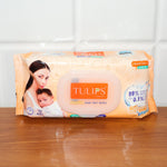 Resealable lid on baby wipes pack ensuring moisture retention