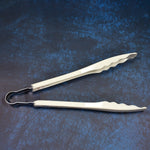 Easy-grip kitchen tongs, perfect for handling food with precision.