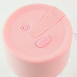 Detail of the sharp stainless steel multi-blades inside the portable juicer.