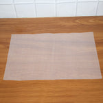 Close-up shot showing the textured surface of the refrigerator mat
