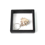 Mini nail clipper keychain in clear showcase with 3D floating effect