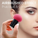 Top view of soft, ergonomic makeup sponge puff with handle