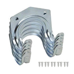 Heavy duty tool hanger hooks mounted on a garage wall, securely holding various garden tools.