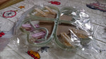 Heart-shaped clothes hanger with 8 clips for efficient drying.