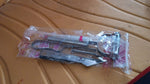 Stainless steel vegetable peeler set placed in modern kitchen setting