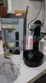 Electric peeler securely holding and peeling a potato automatically