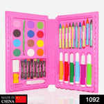 Open Kids Art Kit displaying crayons, watercolor cakes, sketch pens, and accessories.