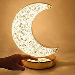 The Moon Crystal Lamp illuminating a room with a warm, inviting light.