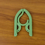 Portable foldable travel hanger holding clothes securely during trips