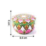 Decorative mandala metal candle container showcasing vibrant colors