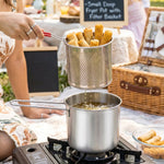 Deep frying in progress with stainless steel pot and basket
