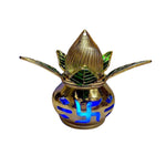 Hand holding a small, elegant gold plated LED Kalash light for festive celebrations.
