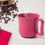 Overhead shot of a plastic mug, emphasizing its wide opening suitable for easy cleaning.