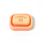 Assorted soap-shaped erasers packaged in a compact case
