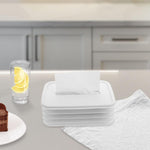 Foldable silicone tissue holder complements a modern living space.