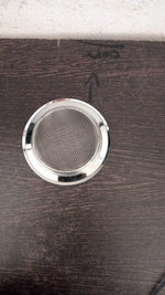 Top-down view of the effective drain stopper, preventing debris from entering the pipes.