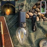 Carabiner clip attached to solar camping lantern for hanging