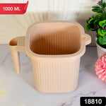 Transparent Plastic Bath Mug with a sturdy handle, ideal for daily use.